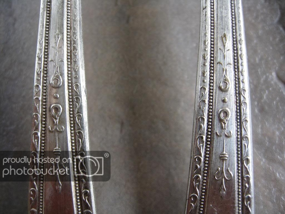 Help ID Flatware Marked " Plated With Pure Silver" Reading American