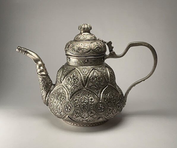 silver repousse teapot 1