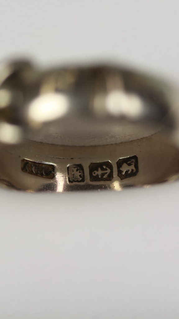 Please help me to identify the Hallmark. Fake? Reading Silver