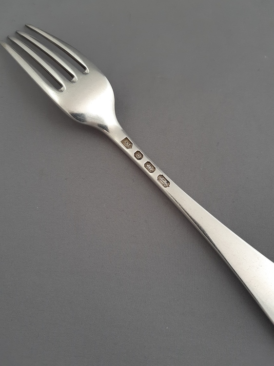 Help in identifying the Marks on this flatware What is it? Silver