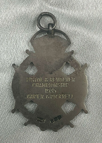 pistol-award-verso