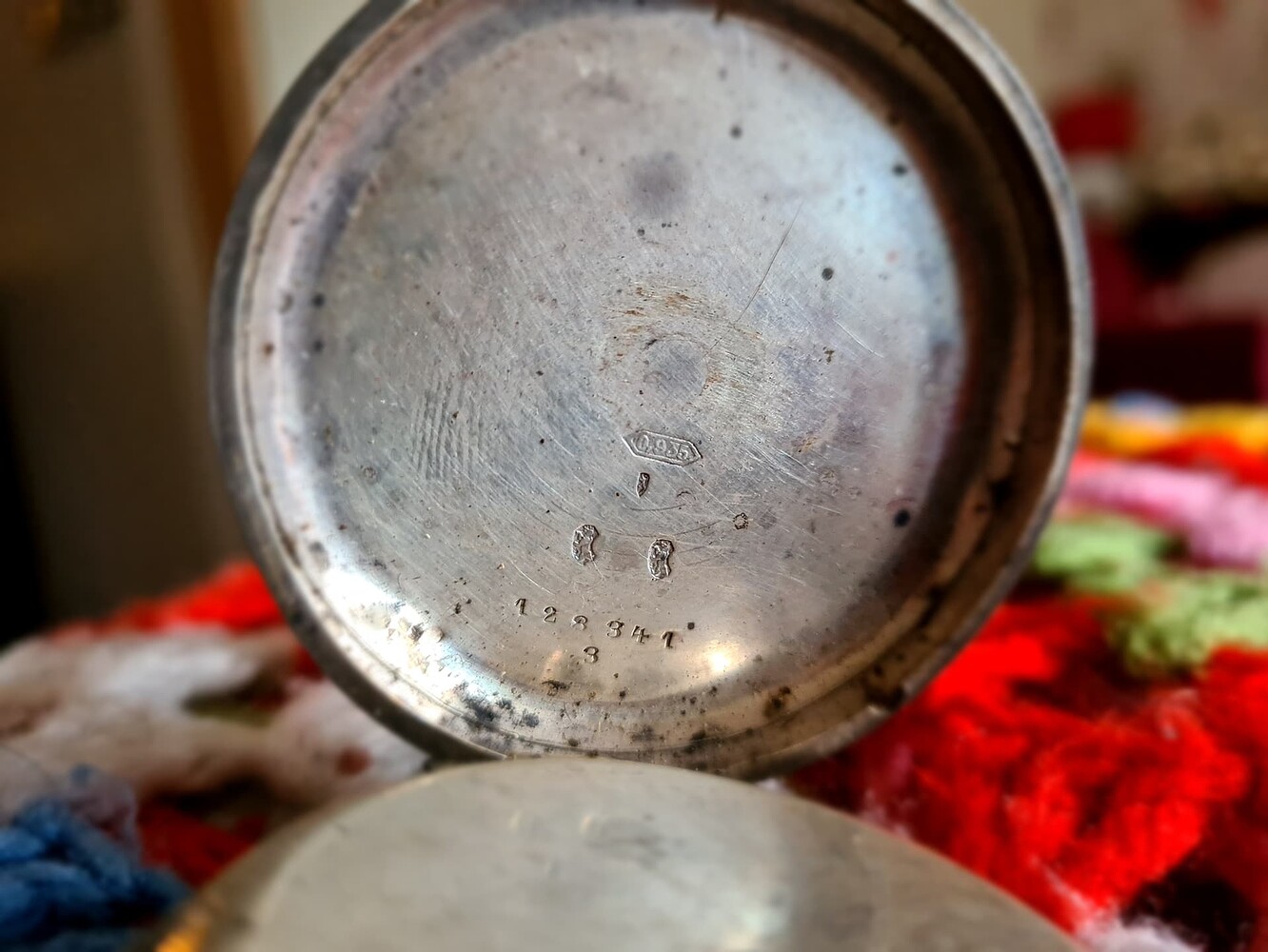 Can anyone identify these marks on a pocket watch British Silver