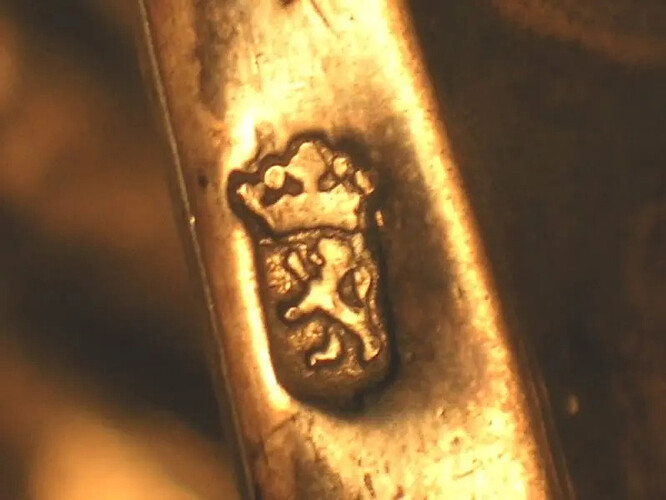 Lion Rampant in crowned shield