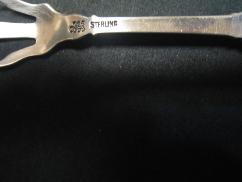 1 tongs claws and S sterling.jpg