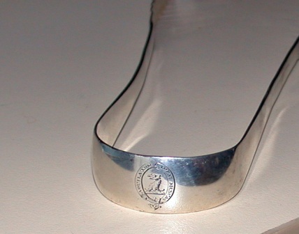 Closeup of silver tongs.jpg