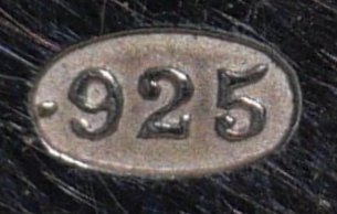 925b