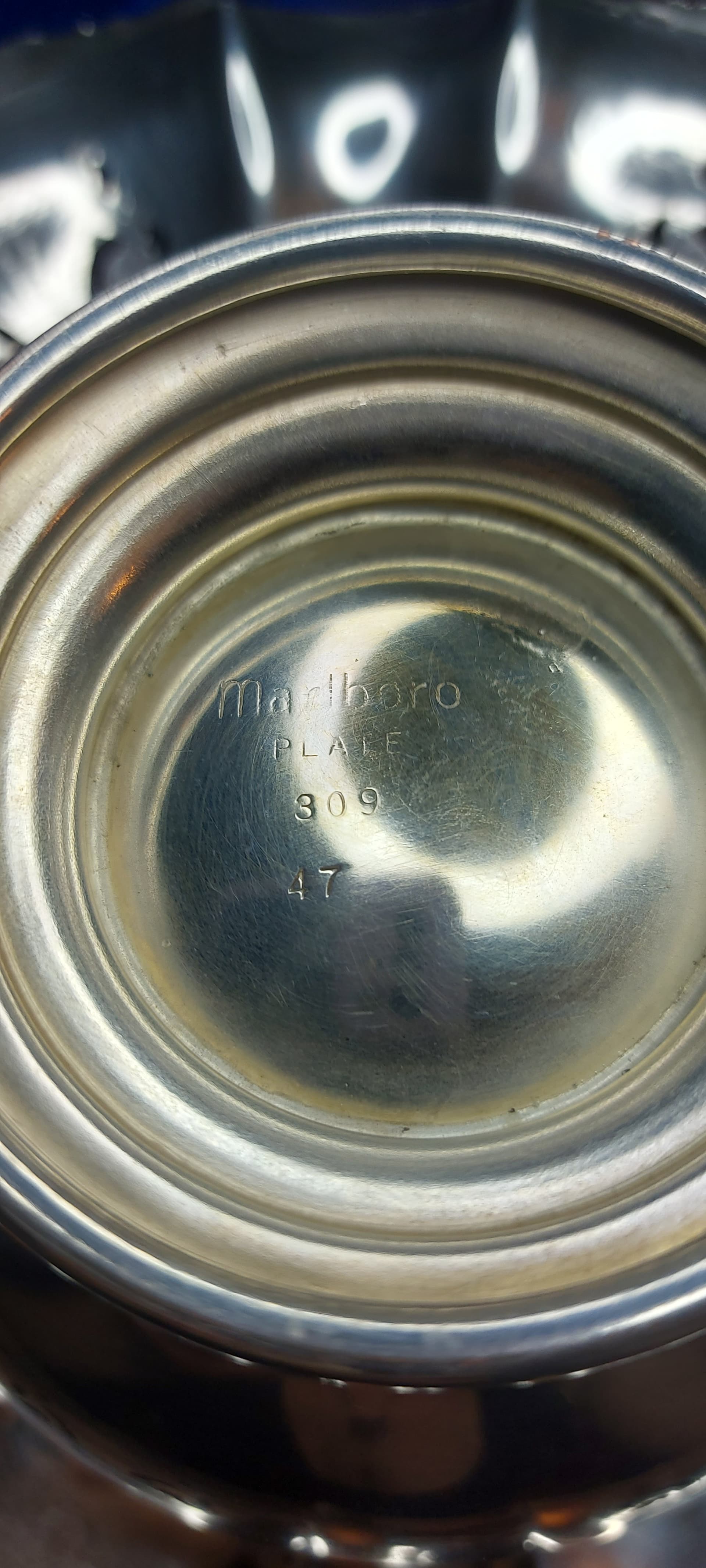 Can anyone tell me more about this Marlboro plate - Silver